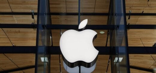 A sleek iPhone on a dark background with the EU flag faintly overlaid, symbolizing Apple’s legal battle against EU regulations.